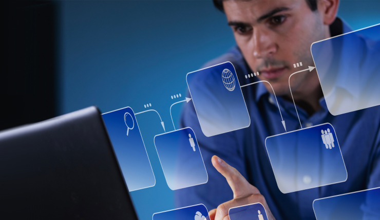 man looking at computer